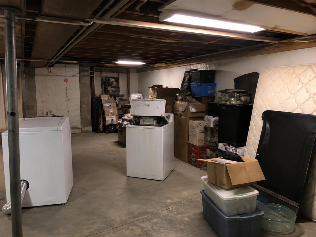 Basement & appliances before JDC Junk Removal arrived